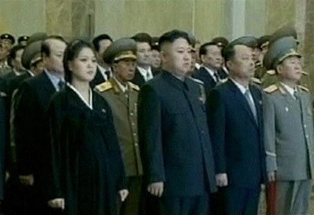 Ri Sul-joo (L), the wife of North Korean leader Kim Jong-un (2nd L), is seen during the inaugural ceremony of the Kumsusan Palace Of The Sun Ri Sul-joo (L), the wife of North Korean leader Kim Jong-un (2nd L), is seen during the inaugural ceremony of the Kumsusan Palace Of The Sun