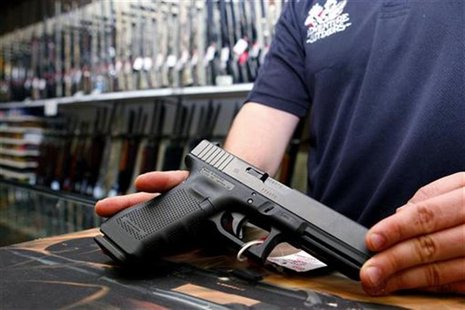 A Glock handgun available in a raffle promotion is shown at Adventures Outdoors in Smyrna, Georgia, October 25, 2012. REUTERS/Tami Chappell A Glock handgun available in a raffle promotion is shown at Adventures Outdoors in Smyrna, Georgia, October 25, 2012. REUTERS/Tami Chappell