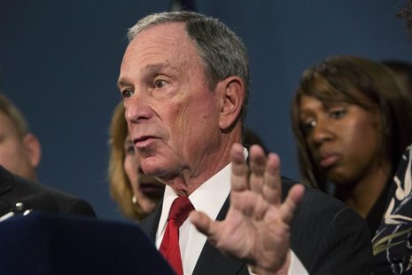 New York City Mayor Michael Bloomberg (C), along with survivors and family members of gun violence victims, addresses the media as part of t New York City Mayor Michael Bloomberg (C), along with survivors and family members of gun violence victims, addresses the media as part of t