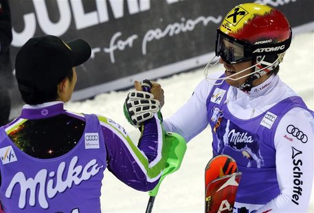 Marcel Hirscher of Austria (R), who won the race, celebrates with Naoki Yuasa of Japan, who placed third, after the men's World Cup slalom r Marcel Hirscher of Austria (R), who won the race, celebrates with Naoki Yuasa of Japan, who placed third, after the men's World Cup slalom r