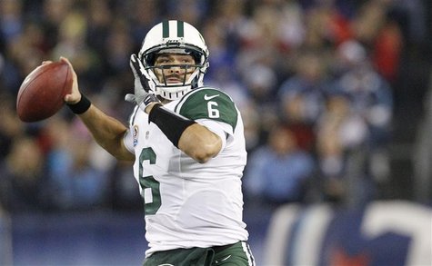 New York Jets' quarterback Mark Sanchez (6) passes in the first half of their NFL Monday Night football game against the Tennessee Titans in New York Jets' quarterback Mark Sanchez (6) passes in the first half of their NFL Monday Night football game against the Tennessee Titans in