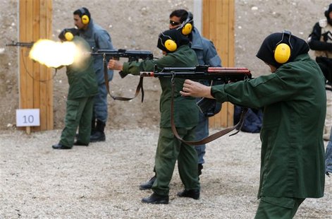 Female Afghan National Police (ANP) trainees fire their weapons at the shooting range at a training centre near the German Bundeswehr army c Female Afghan National Police (ANP) trainees fire their weapons at the shooting range at a training centre near the German Bundeswehr army c
