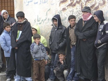 People queue to buy bread at a local bakery at Tel Abyed near Hasaka December 17, 2012. REUTERS/Samer Al-Abdullah/Shaam News Network/Handout People queue to buy bread at a local bakery at Tel Abyed near Hasaka December 17, 2012. REUTERS/Samer Al-Abdullah/Shaam News Network/Handout