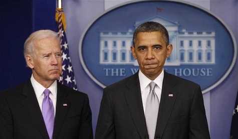 U.S. President Barack Obama, with Vice President Joe Biden (L) at his side, speaks to members of the media in the White House Briefing Room U.S. President Barack Obama, with Vice President Joe Biden (L) at his side, speaks to members of the media in the White House Briefing Room