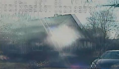 Grainy still from Dashcam video of the mistaken take-down of Michelle Selbee Grainy still from Dashcam video of the mistaken take-down of Michelle Selbee