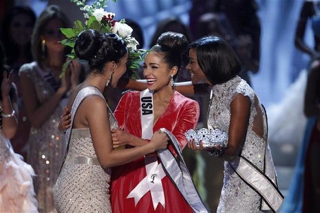 Miss USA Olivia Culpo (C) is congratulated by Miss Teen USA 2012 Logan West (L) and Miss Universe 2011 Leila Lopes from Angola after being c Miss USA Olivia Culpo (C) is congratulated by Miss Teen USA 2012 Logan West (L) and Miss Universe 2011 Leila Lopes from Angola after being c
