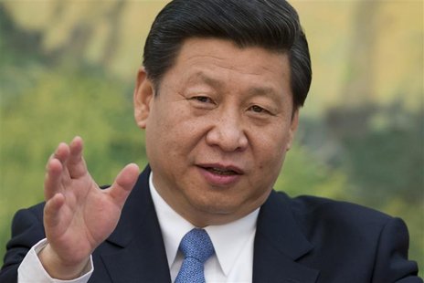 China's newly appointed leader Xi Jinping gestures as he attends a meeting with foreign experts at the Great Hall of the People in Beijing D China's newly appointed leader Xi Jinping gestures as he attends a meeting with foreign experts at the Great Hall of the People in Beijing D