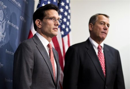 U.S. House Majority Leader Rep. Eric Cantor (R-VA) and House Speaker John Boehner (R)(R-OH) attend a news conference after a Republican cauc U.S. House Majority Leader Rep. Eric Cantor (R-VA) and House Speaker John Boehner (R)(R-OH) attend a news conference after a Republican cauc