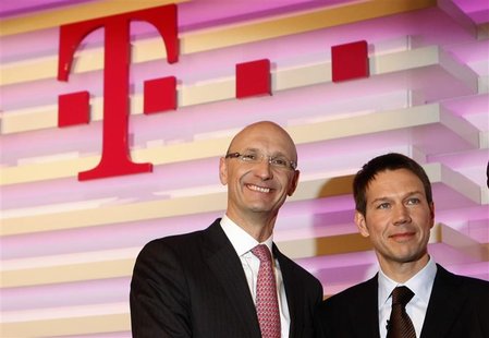 File picture shows designated new finance chief Timotheus Hoettges (L) and Rene Obermann, CEO of Deutsche Telekom AG before the annual news File picture shows designated new finance chief Timotheus Hoettges (L) and Rene Obermann, CEO of Deutsche Telekom AG before the annual news