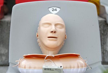 A plastic CPR training mannequin is seen as Romanian volunteers learn how to save lives by practicing CPR on 700 plastic models, in an attem A plastic CPR training mannequin is seen as Romanian volunteers learn how to save lives by practicing CPR on 700 plastic models, in an attem