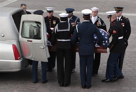 A military honor guard carries the casket of Senator Daniel Inouye (D-HI) as it arrives on Capitol Hill in Washington December 20, 2012. REU A military honor guard carries the casket of Senator Daniel Inouye (D-HI) as it arrives on Capitol Hill in Washington December 20, 2012. REU