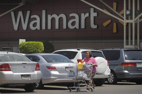 A shopper carts her purchases from a Wal-Mart store in Mexico City, April 24, 2012. REUTERS/Edgard Garrido A shopper carts her purchases from a Wal-Mart store in Mexico City, April 24, 2012. REUTERS/Edgard Garrido