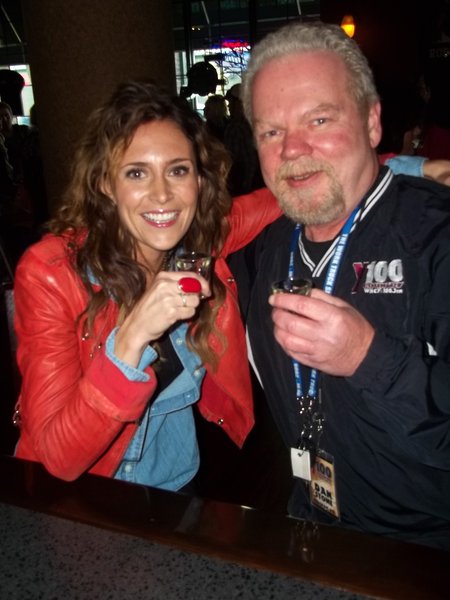 Dan Stone and Kelleigh Bannen belly up to the bar at Brett Favre's Steakhouse