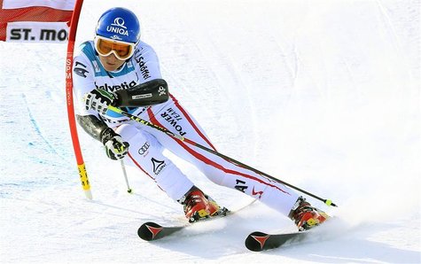 Marlies Schild of Austria clears a gate during the second run of the Giant slalom race at the women's Alpine skiing World Cup at the Corvigl Marlies Schild of Austria clears a gate during the second run of the Giant slalom race at the women's Alpine skiing World Cup at the Corvigl