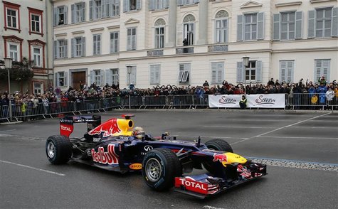 Red Bull three-time Formula One world champion Sebastian Vettel of Germany drives his racing car during a promotional event in the Austrian Red Bull three-time Formula One world champion Sebastian Vettel of Germany drives his racing car during a promotional event in the Austrian