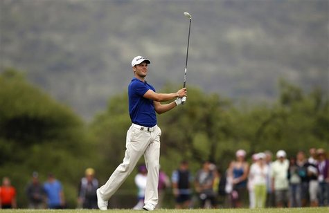 Martin Kaymer of Germany watches his shot on the third fairway during the 2012 Nedbank Golf Challenge in Sun City, December 2, 2012. REUTERS Martin Kaymer of Germany watches his shot on the third fairway during the 2012 Nedbank Golf Challenge in Sun City, December 2, 2012. REUTERS