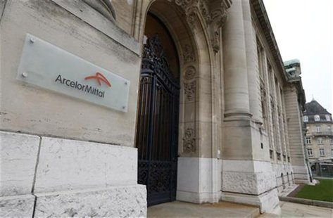 The logo of ArcelorMittal company is seen at the entrance of its headquarters in Luxembourg in this picture taken on November 20, 2012. REUT The logo of ArcelorMittal company is seen at the entrance of its headquarters in Luxembourg in this picture taken on November 20, 2012. REUT