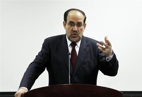 Iraq's Prime Minister Nuri al-Maliki speaks during the opening ceremony of the Defence University for Military Studies inside Baghdad's heav Iraq's Prime Minister Nuri al-Maliki speaks during the opening ceremony of the Defence University for Military Studies inside Baghdad's heav