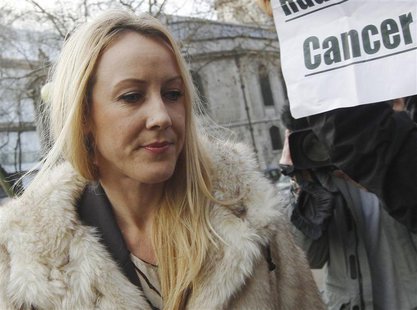 Sally Roberts, Mother of seven year old cancer sufferer Neon, arrives at The High Court in central London December 21, 2012. REUTERS/Luke Ma Sally Roberts, Mother of seven year old cancer sufferer Neon, arrives at The High Court in central London December 21, 2012. REUTERS/Luke Ma