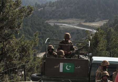 Pakistan army soldiers sit in a vehicle during their patrol at an army outpost in Kharang, about 40 km (21 miles) from Wana November 28, 201 Pakistan army soldiers sit in a vehicle during their patrol at an army outpost in Kharang, about 40 km (21 miles) from Wana November 28, 201