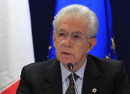 Italy's Prime Minister Mario Monti arrives at a news conference after a European Union leaders summit in Brussels December 14, 2012. REUTERS Italy's Prime Minister Mario Monti arrives at a news conference after a European Union leaders summit in Brussels December 14, 2012. REUTERS