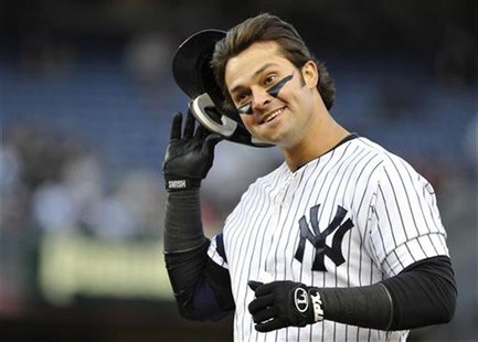New York Yankees' Nick Swisher reacts after grounding out against the Baltimore Orioles during the second inning in Game 5 of their MLB ALDS New York Yankees' Nick Swisher reacts after grounding out against the Baltimore Orioles during the second inning in Game 5 of their MLB ALDS