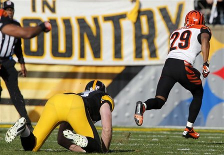 Pittsburgh Steelers Heath Miller watches as Cincinnati Bengals Leon Hall runs an intercepted ball back for a touchdown in the first quarter Pittsburgh Steelers Heath Miller watches as Cincinnati Bengals Leon Hall runs an intercepted ball back for a touchdown in the first quarter
