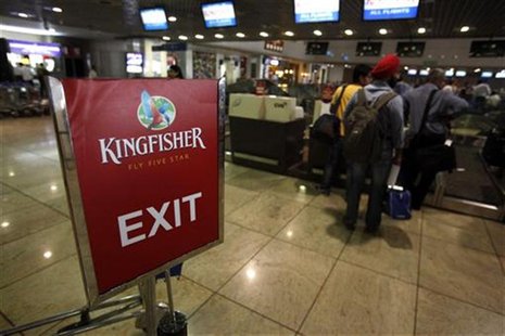 Kingfisher Airlines customers wait in a check-in queue at Mumbai's domestic airport March 20, 2012. REUTERS/Vivek Prakash Kingfisher Airlines customers wait in a check-in queue at Mumbai's domestic airport March 20, 2012. REUTERS/Vivek Prakash