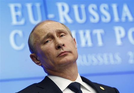 Russian President Vladimir Putin looks on during a joint news conference with European Council President Herman Van Rompuy and European Comm Russian President Vladimir Putin looks on during a joint news conference with European Council President Herman Van Rompuy and European Comm