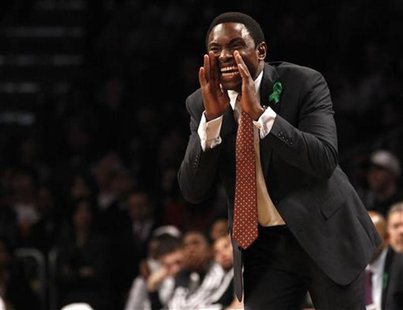 Brooklyn Nets head coach Avery Johnson shouts instructions to his players in the second quarter of their NBA basketball game against the Bos Brooklyn Nets head coach Avery Johnson shouts instructions to his players in the second quarter of their NBA basketball game against the Bos