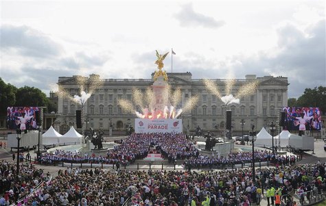 Athletes stand together on the Queen Victoria Memorial during a parade of British Olympic and Paralympic athletes in front of Buckingham Pal Athletes stand together on the Queen Victoria Memorial during a parade of British Olympic and Paralympic athletes in front of Buckingham Pal
