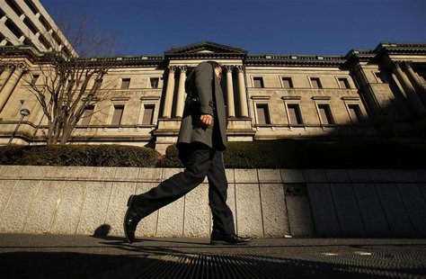 A man walks past the Bank of Japan headquarters in Tokyo December 19, 2012. REUTERS/Yuriko Nakao A man walks past the Bank of Japan headquarters in Tokyo December 19, 2012. REUTERS/Yuriko Nakao