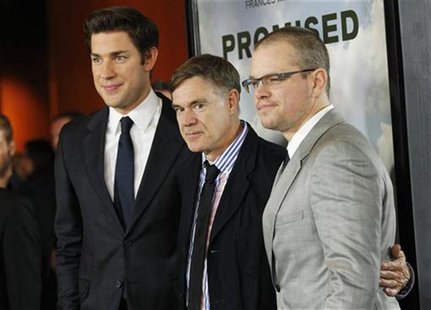 Director Gus Van Sant (C) poses with cast members Matt Damon (R) and John Krasinski at the premiere of "Promised Land" at the Directors Guil Director Gus Van Sant (C) poses with cast members Matt Damon (R) and John Krasinski at the premiere of "Promised Land" at the Directors Guil