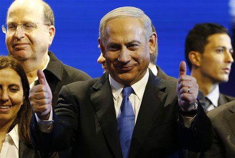 Israel's Prime Minister Benjamin Netanyahu (C) is seen during the launch of his Likud Beiteinu party campaign ahead of the upcoming January Israel's Prime Minister Benjamin Netanyahu (C) is seen during the launch of his Likud Beiteinu party campaign ahead of the upcoming January