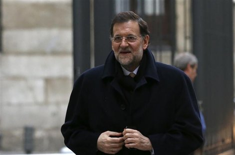 Spain's Prime Minister Mariano Rajoy arrives at parliamentary session for the formal approbation of the budget for 2013 at Parliament in Mad Spain's Prime Minister Mariano Rajoy arrives at parliamentary session for the formal approbation of the budget for 2013 at Parliament in Mad