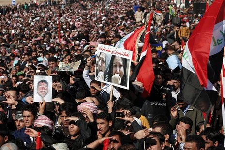 Iraqi Sunni Muslims take part in an anti-government demonstration in Falluja, 50 km (30 miles) west of Baghdad, December 28, 2012. REUTERS/T Iraqi Sunni Muslims take part in an anti-government demonstration in Falluja, 50 km (30 miles) west of Baghdad, December 28, 2012. REUTERS/T