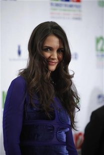 Actress Katie Holmes poses during the "12-12-12" benefit concert for victims of Superstorm Sandy at Madison Square Garden in New York, Decem Actress Katie Holmes poses during the "12-12-12" benefit concert for victims of Superstorm Sandy at Madison Square Garden in New York, Decem