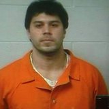 Raulie Casteel appeared in prison orange for his video arraignment on Thursday. Raulie Casteel appeared in prison orange for his video arraignment on Thursday.