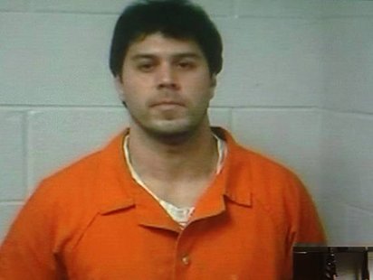 Raulie Casteel appeared in prison orange for his video arraignment on Thursday. Raulie Casteel appeared in prison orange for his video arraignment on Thursday.