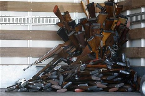 A small portion of guns that were turned in by their owners are stacked inside a truck at a gun buyback held by the Los Angeles Police Depar A small portion of guns that were turned in by their owners are stacked inside a truck at a gun buyback held by the Los Angeles Police Depar