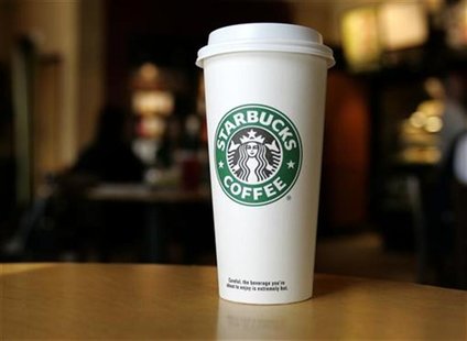 A cup displaying the Starbucks Coffee logo is pictured at one of the coffee chain's store in Boca Raton, Florida January 19, 2010. REUTERS/J A cup displaying the Starbucks Coffee logo is pictured at one of the coffee chain's store in Boca Raton, Florida January 19, 2010. REUTERS/J