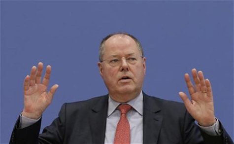 Top candidate for the 2013 German general elections Peer Steinbrueck of the German Social Democratic Party addresses a news conference in Be Top candidate for the 2013 German general elections Peer Steinbrueck of the German Social Democratic Party addresses a news conference in Be