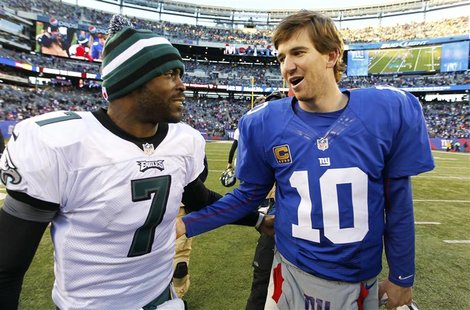 New York Giants quarterback Eli Manning (R) talks with Philadelphia Eagles quarterback Michael Vick after their NFL football game in East Ru New York Giants quarterback Eli Manning (R) talks with Philadelphia Eagles quarterback Michael Vick after their NFL football game in East Ru