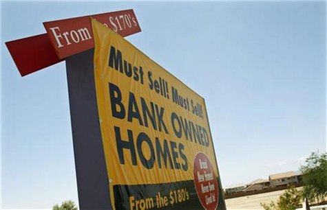 A sign offering bank owned homes for sale is seen in a subdivision in Maricopa, Arizona in this file photo from May 27, 2009. REUTERS/Joshua A sign offering bank owned homes for sale is seen in a subdivision in Maricopa, Arizona in this file photo from May 27, 2009. REUTERS/Joshua