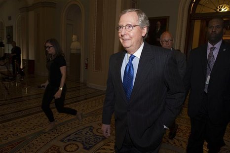 U.S. Senate Minority Leader Mitch McConnell (R-KY) leaves the Senate Chamber for the caucus at the U.S. Capitol in Washington December 30, 2 U.S. Senate Minority Leader Mitch McConnell (R-KY) leaves the Senate Chamber for the caucus at the U.S. Capitol in Washington December 30, 2