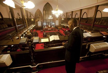 LaMonte Thomas of North Charleston, South Carolina, stands in the choir balcony just before the start of the Watch Night service at Emanuel LaMonte Thomas of North Charleston, South Carolina, stands in the choir balcony just before the start of the Watch Night service at Emanuel