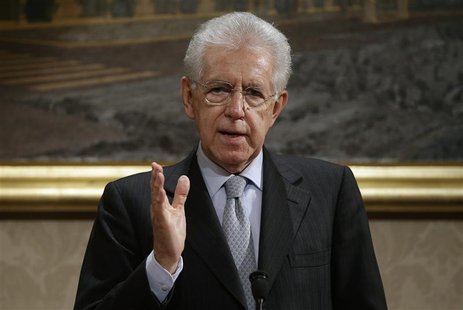 Italy's outgoing Prime Minister Mario Monti gestures during a news conference in Rome December 28, 2012. REUTERS/Tony Gentile Italy's outgoing Prime Minister Mario Monti gestures during a news conference in Rome December 28, 2012. REUTERS/Tony Gentile