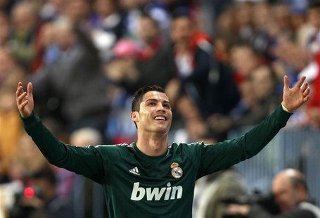 Real Madrid's Cristiano Ronaldo gestures during their Spanish First Division soccer match against Malaga at La Rosaleda stadium in Malaga De Real Madrid's Cristiano Ronaldo gestures during their Spanish First Division soccer match against Malaga at La Rosaleda stadium in Malaga De