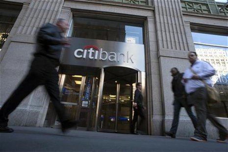 Passersby walk in front of a Citibank branch in New York, October 16, 2012. REUTERS/Keith Bedford Passersby walk in front of a Citibank branch in New York, October 16, 2012. REUTERS/Keith Bedford