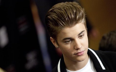 Justin Bieber attends the 3rd annual Tribeca Disruptive Innovation Awards during the 2012 Tribeca Film Festival at NYU Paulson Auditorium in Justin Bieber attends the 3rd annual Tribeca Disruptive Innovation Awards during the 2012 Tribeca Film Festival at NYU Paulson Auditorium in